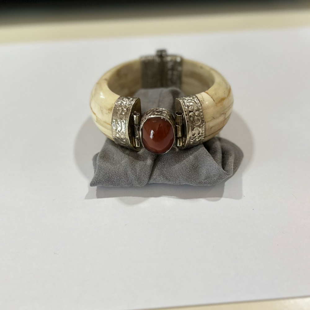 Silver and Cream Bracelet with Red Stone